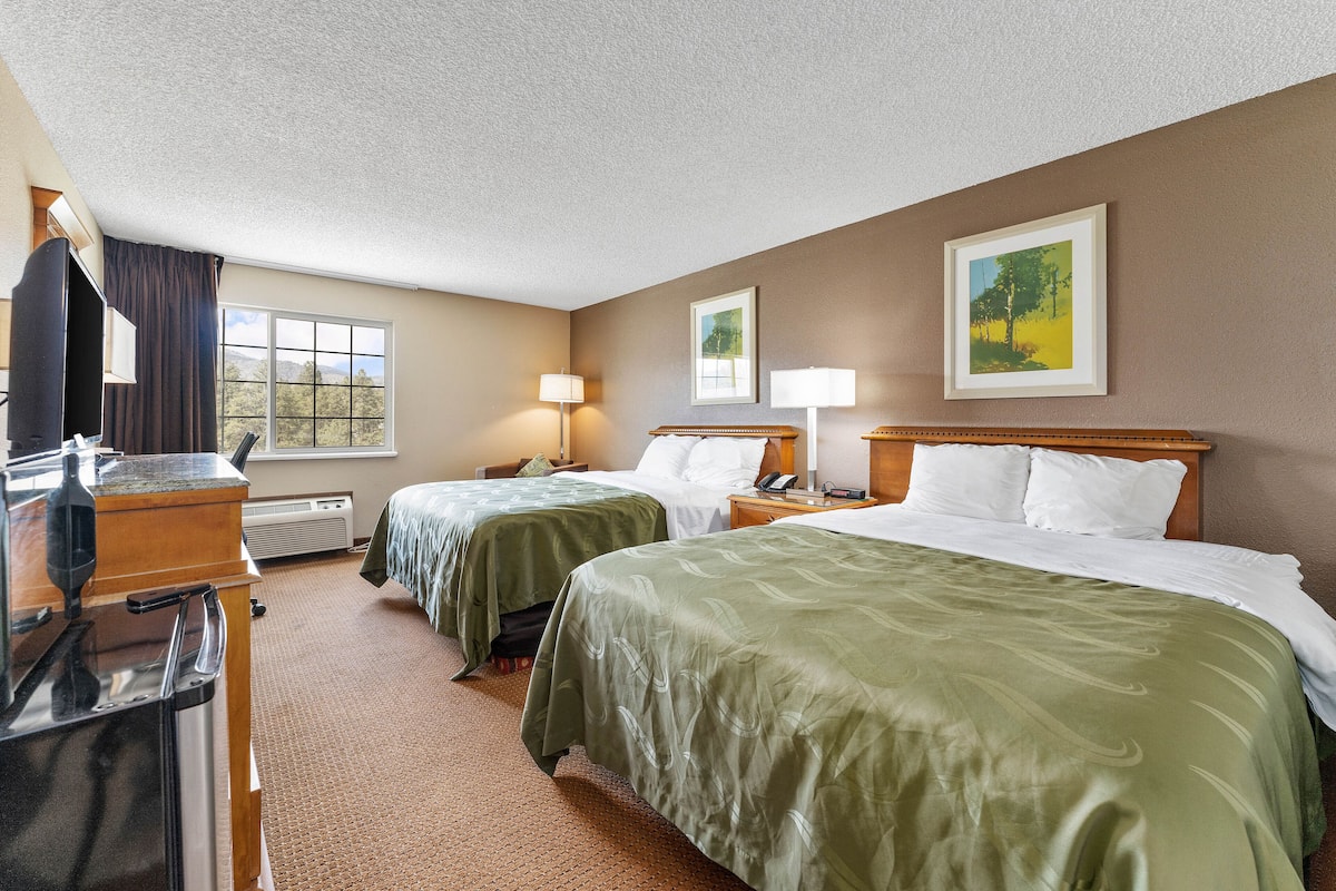 Down comforters, desk, blackout drapes, soundproofing