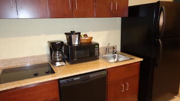 Suite, 1 King Bed with Sleeper Sofa, Accessible Benched Tub, Non Smoking | Private kitchenette | Fridge, coffee/tea maker