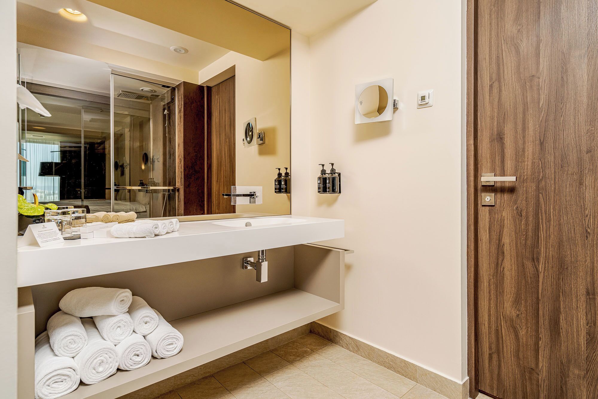 business double or twin room | bathroom | rainfall showerhead, designer toiletries, hair dryer, bathrobes