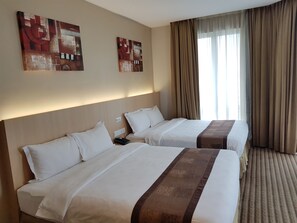 Deluxe Quadruple Room, 2 Queen Beds, Non Smoking | Down comforters, Select Comfort beds, in-room safe - DeHome Boutique Hotel (Kuching)
