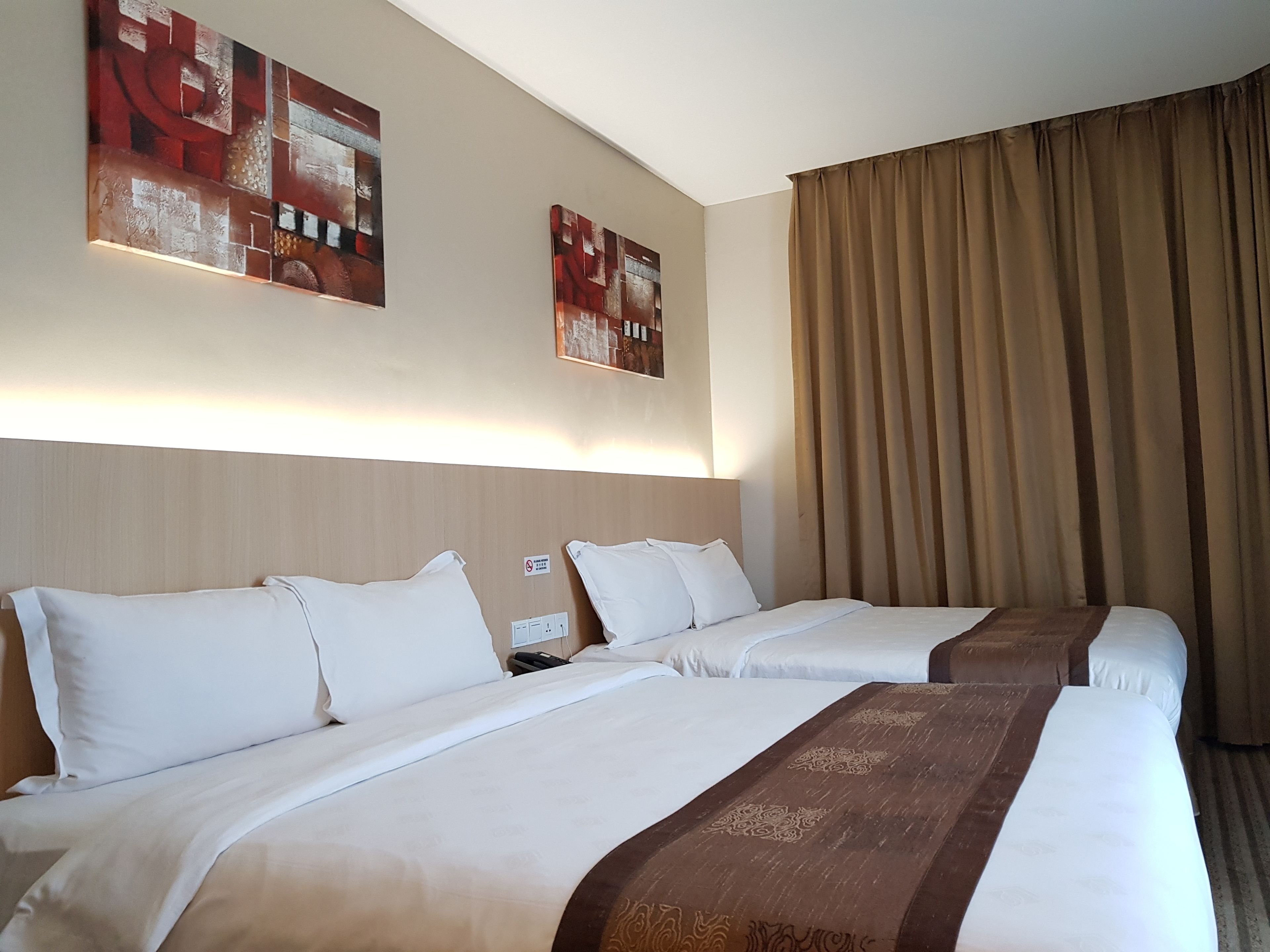 deluxe quadruple room, 2 queen beds, non smoking | down duvets, select comfort beds, in-room safe, individually decorated