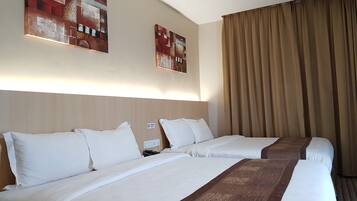 Down duvets, Select Comfort beds, in-room safe, individually decorated