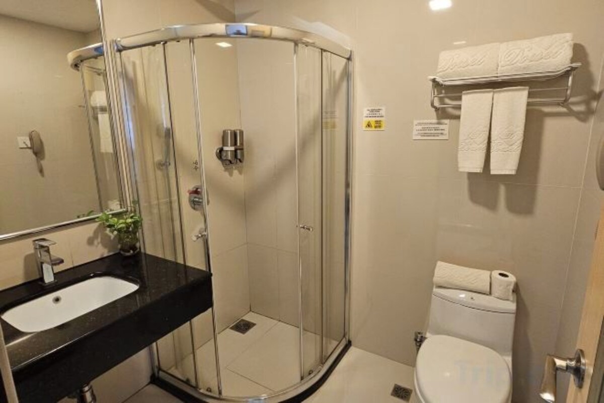 Shower, rainfall showerhead, designer toiletries, hair dryer