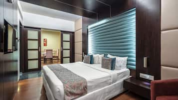 Suite, 1 lit double | Minibar, coffres-forts dans les chambres, lits pliants/supplémentaires