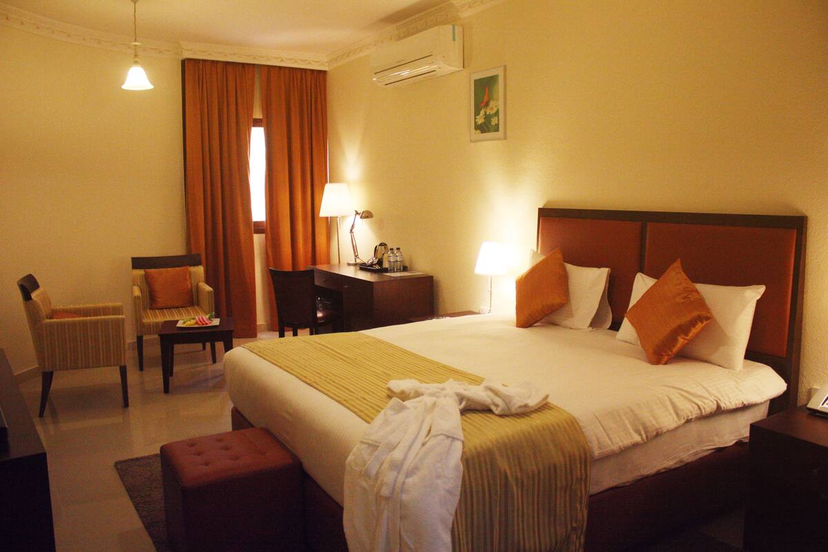 Superior Room | Minibar, in-room safe, desk, blackout drapes