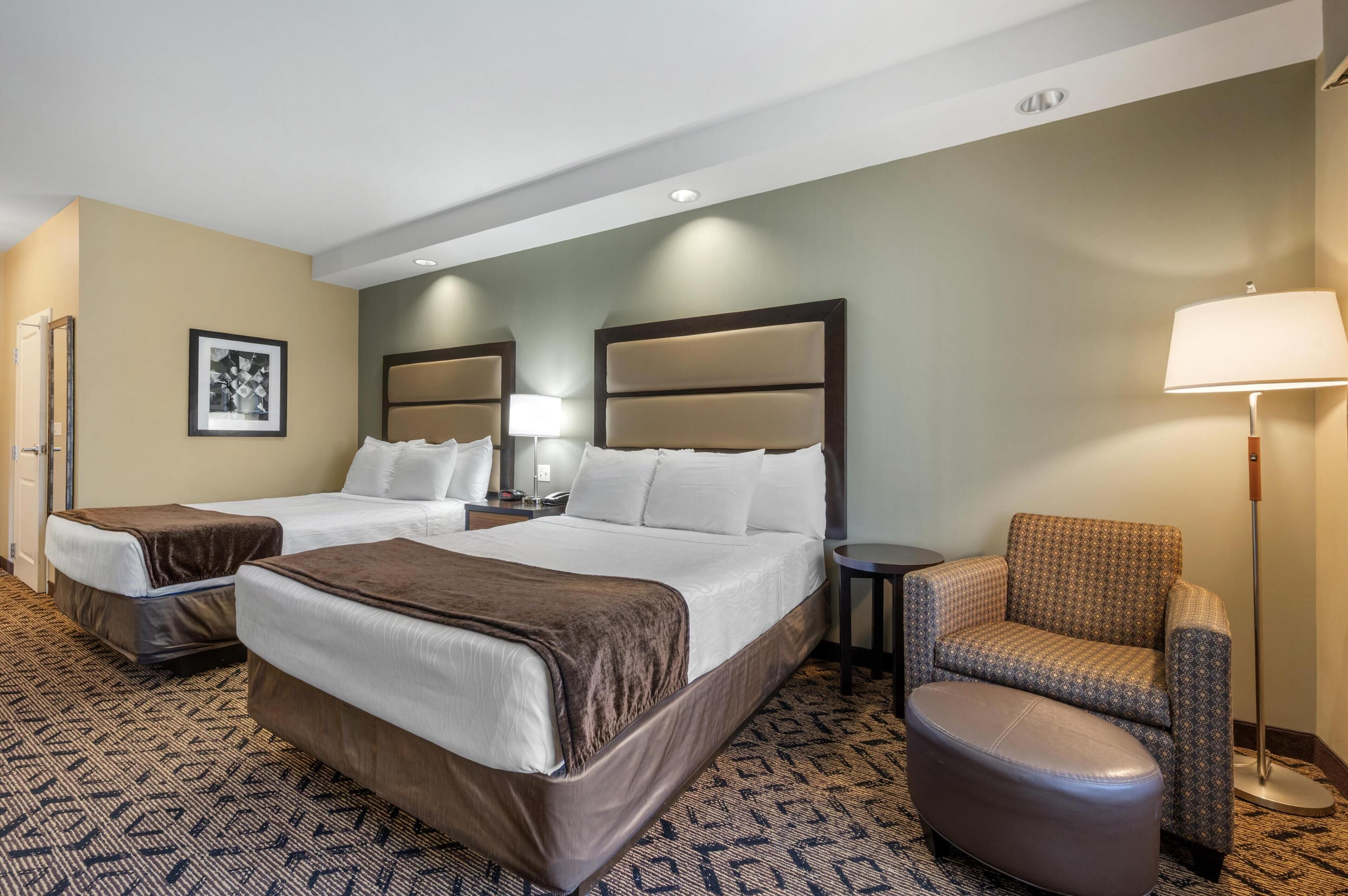 standard room, 2 queen beds, refrigerator & microwave, corner | in-room safe, individually decorated, individually furnished, desk