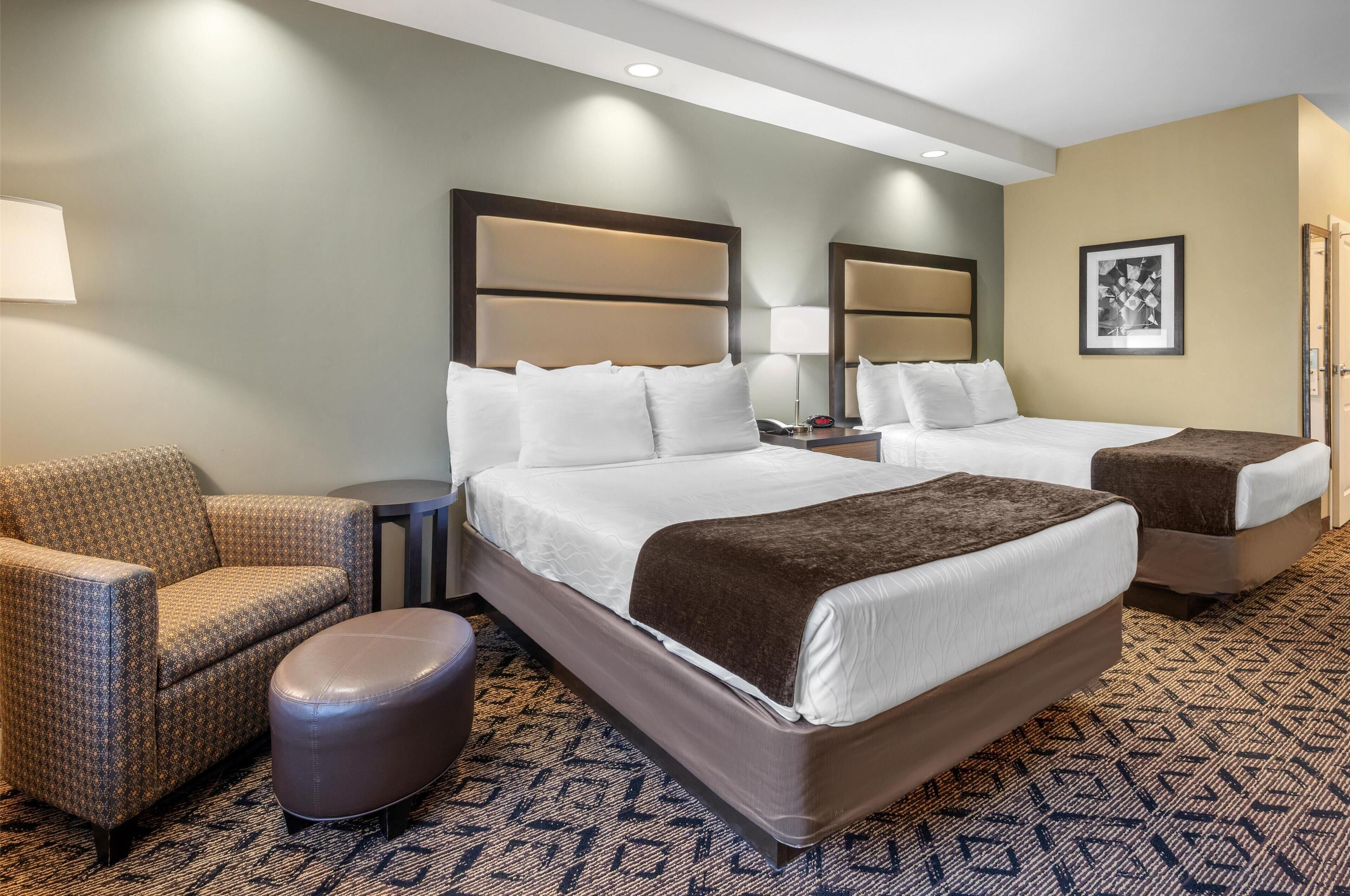 standard room, 2 queen beds, non smoking, refrigerator & microwave | in-room safe, individually decorated, individually furnished, desk