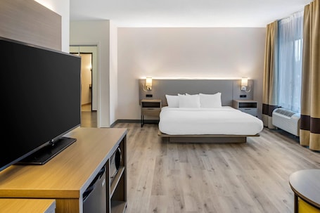 Suite, 1 très grand lit et 1 canapé-lit, accessible aux personnes à mobilité réduite, non-fumeurs | Couette en duvet d'oie, coffres-forts dans les chambres, bureau. Comfort Inn & Suites Sayre