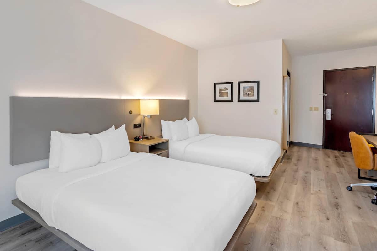 Standard Room, 2 Queen Beds, Non Smoking | Down comforters, in-room safe, desk, laptop workspace