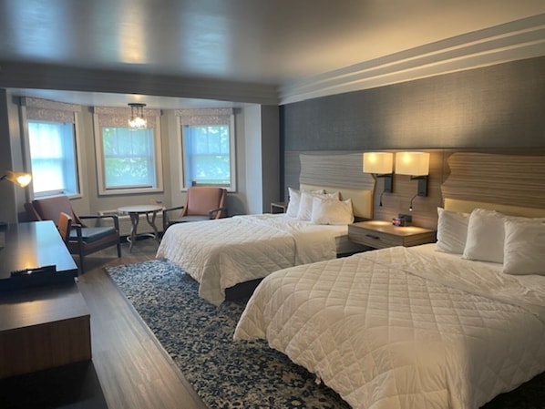 Hypo-allergenic bedding, pillowtop beds, desk, laptop workspace