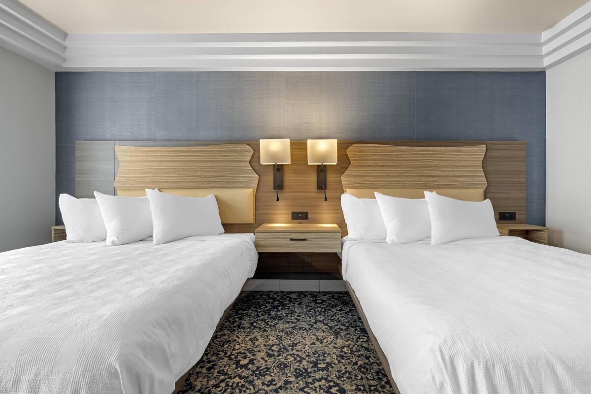 hypo-allergenic bedding, pillow-top beds, desk, laptop workspace