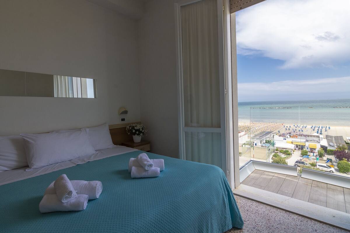 Standard Triple Room, Balcony | In-room safe, desk, free WiFi, bed sheets