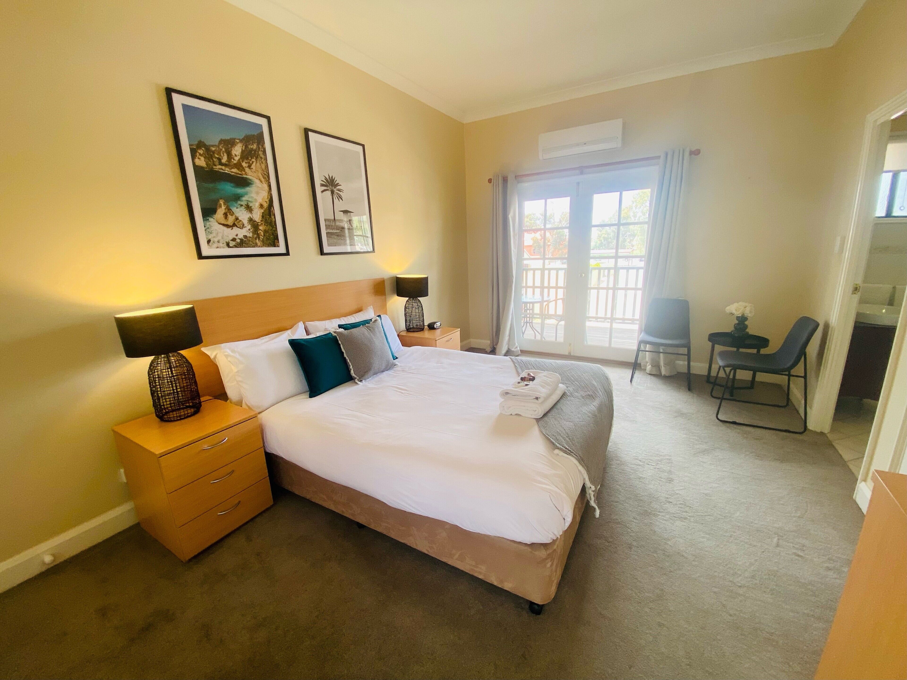 Modern Queen Room | 1 bedroom, individually decorated, individually furnished, bed sheets