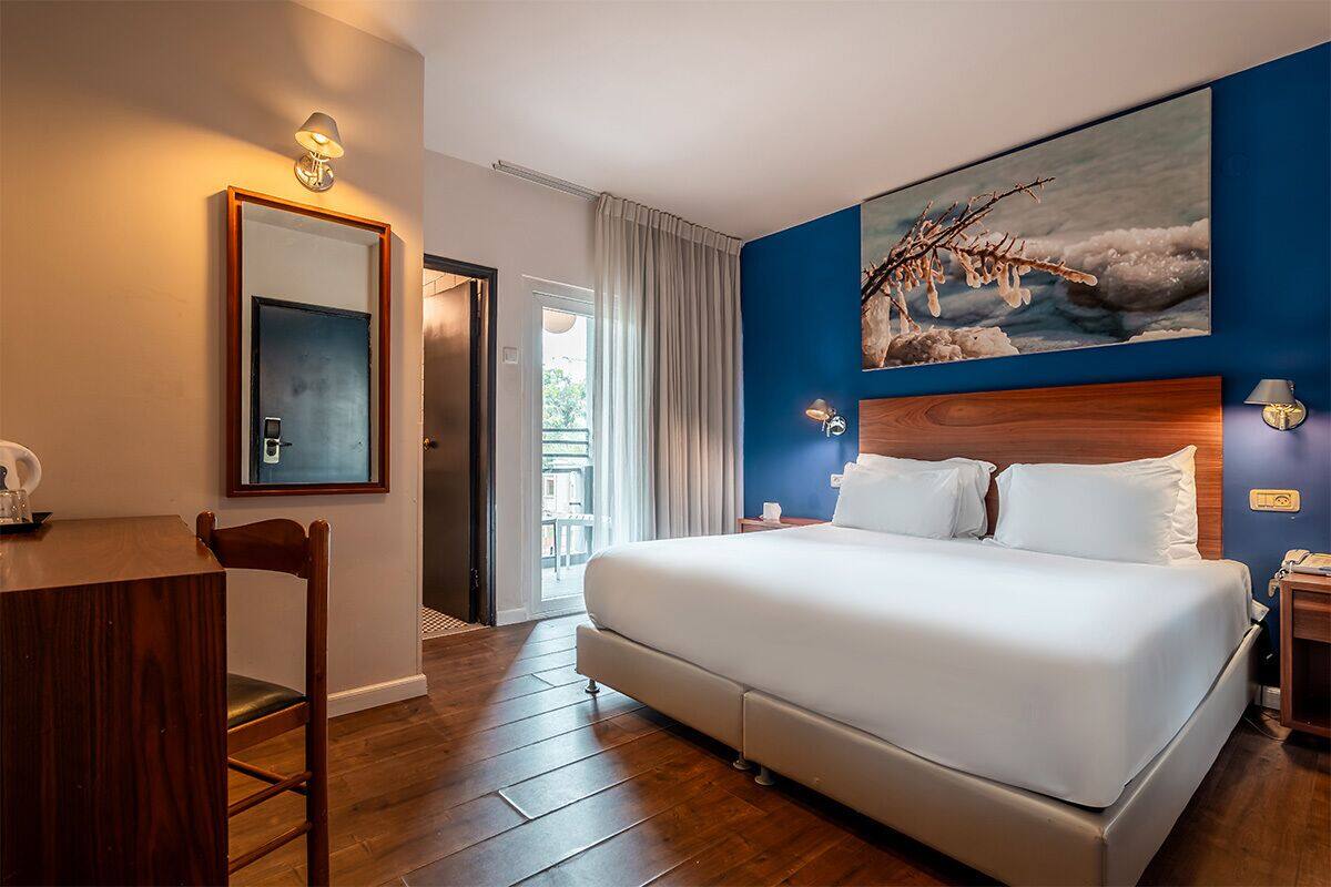 standard room, city view | 1 bedroom, in-room safe, individually decorated, individually furnished