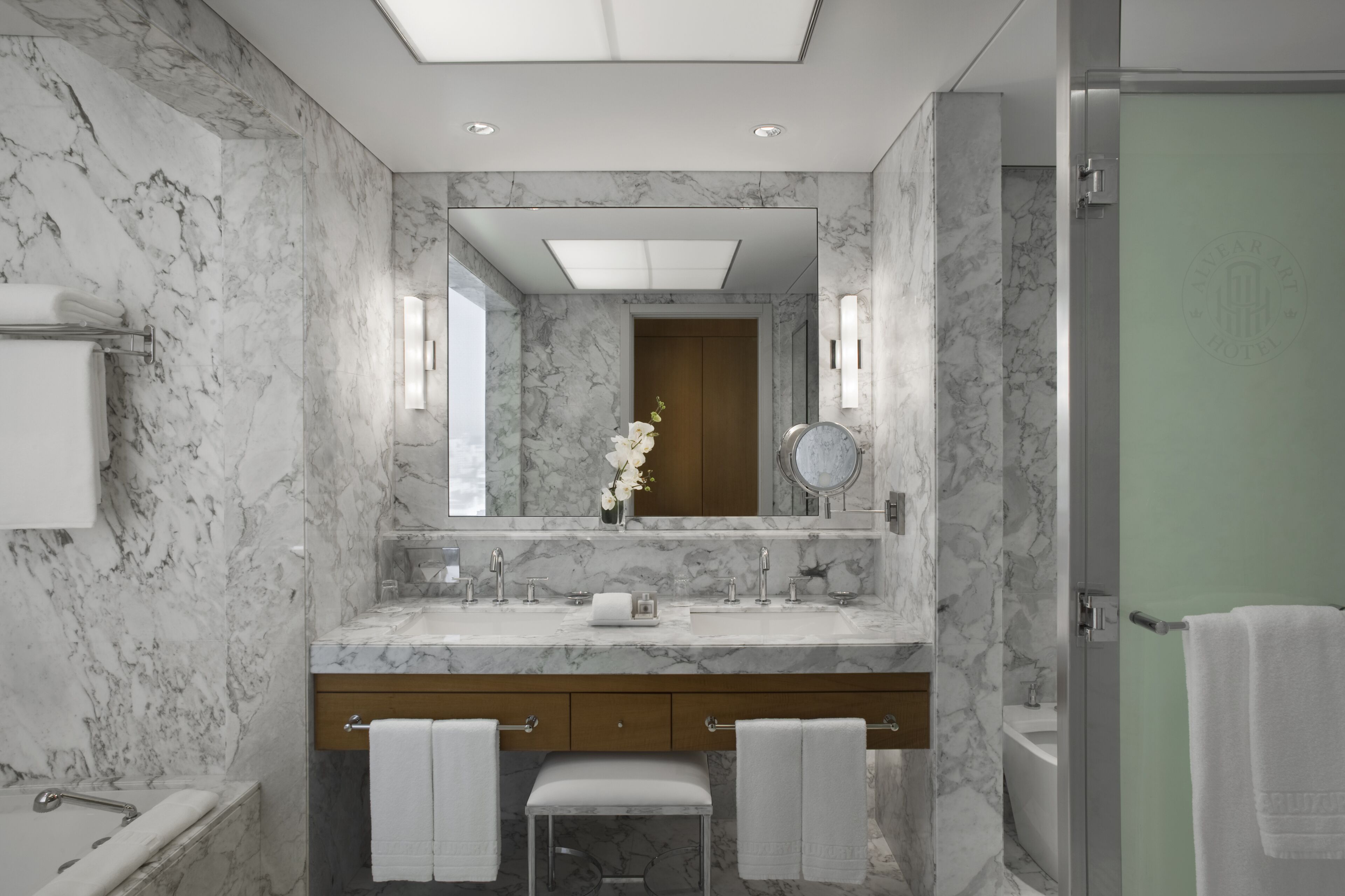 separate bathtub and shower, jetted bath, rainfall showerhead