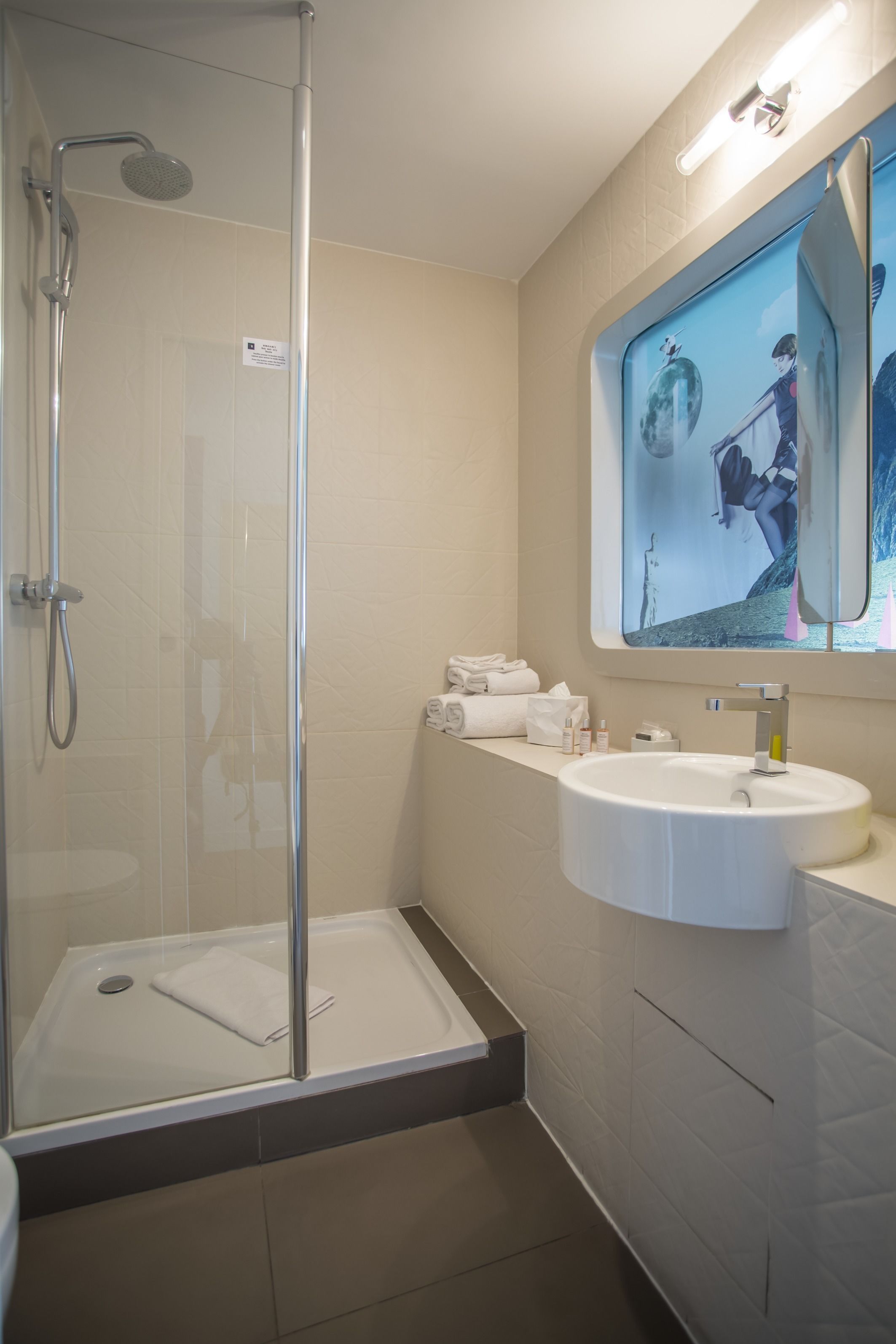 designer toiletries, hair dryer, dressing gowns, towels