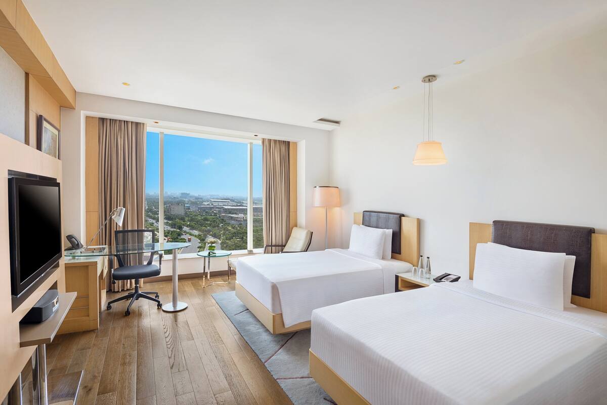 Premium bedding, down comforters, Select Comfort beds, minibar