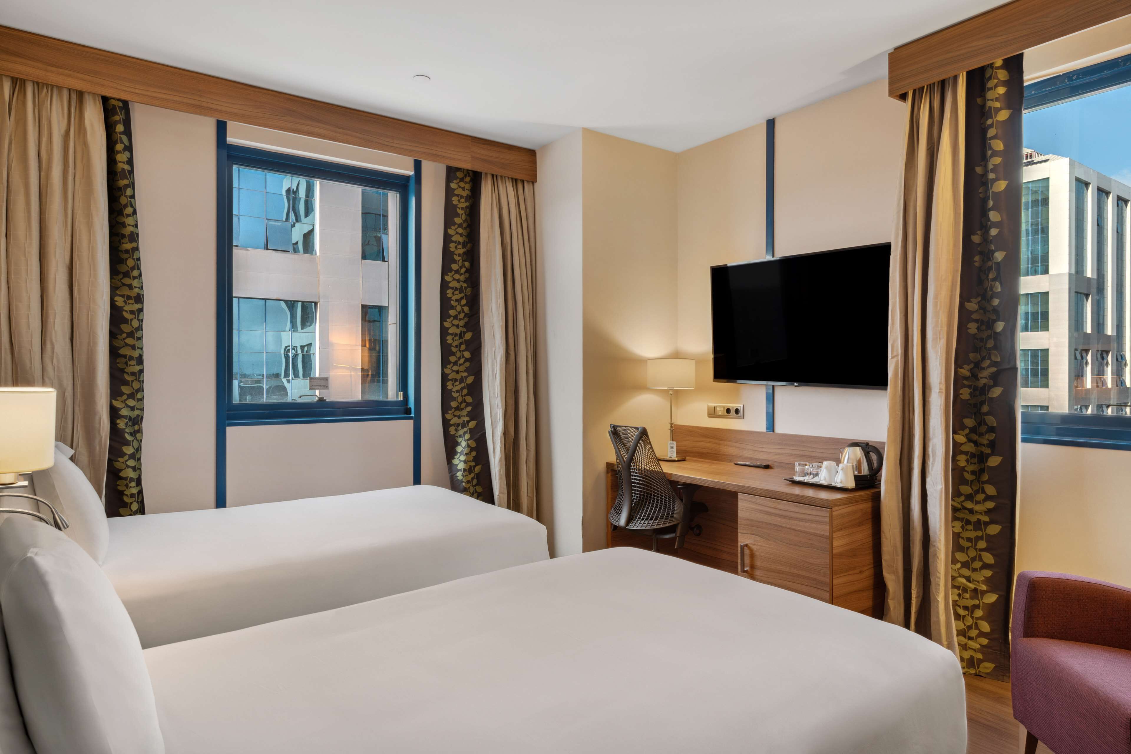 twin room, 2 single beds | in-room safe, blackout curtains, soundproofing, iron/ironing board