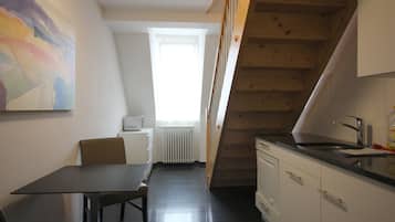 Deluxe Apartment | Private kitchen | Fridge, microwave, stovetop, electric kettle