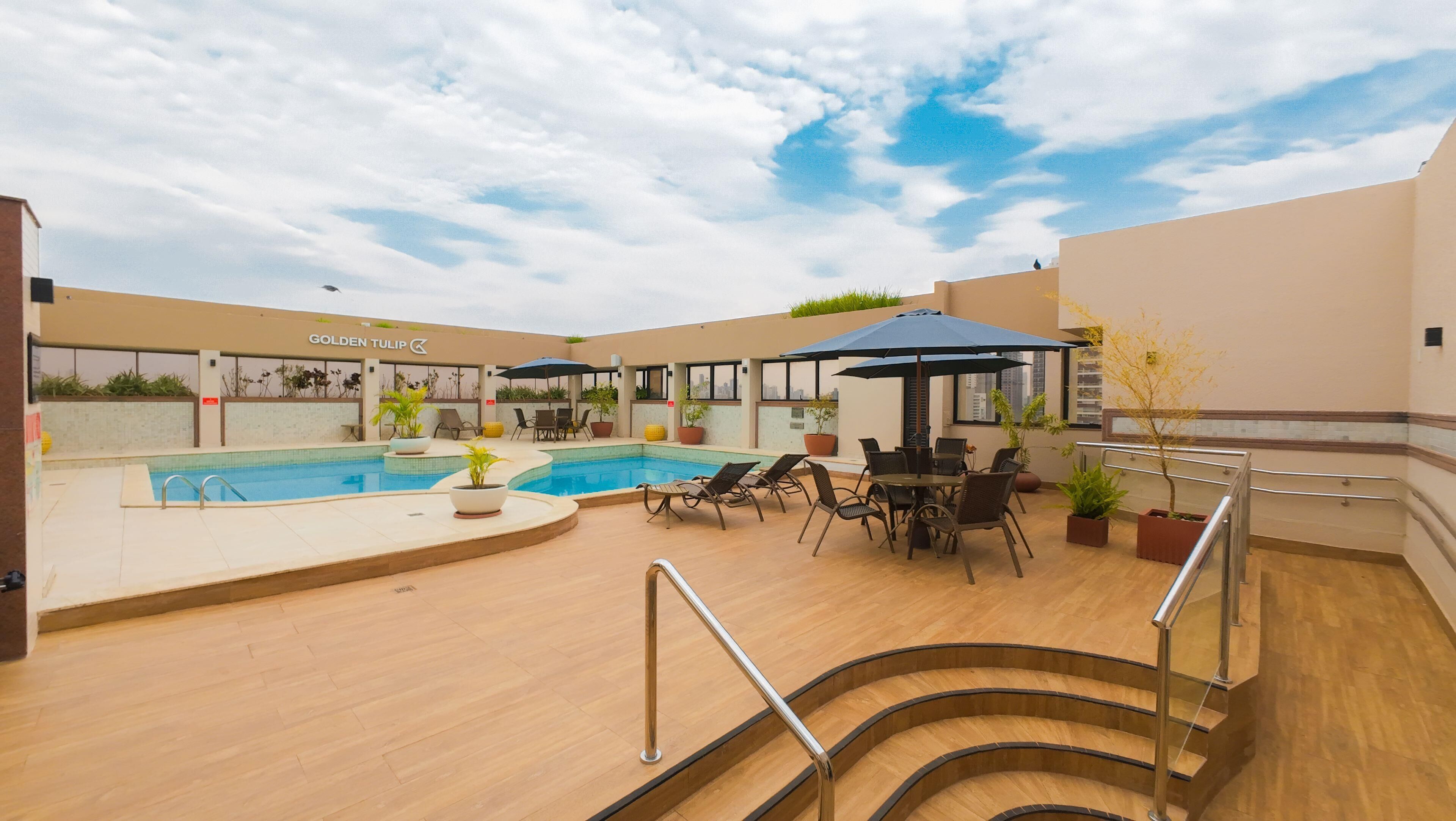 Outdoor pool, pool umbrellas, pool loungers