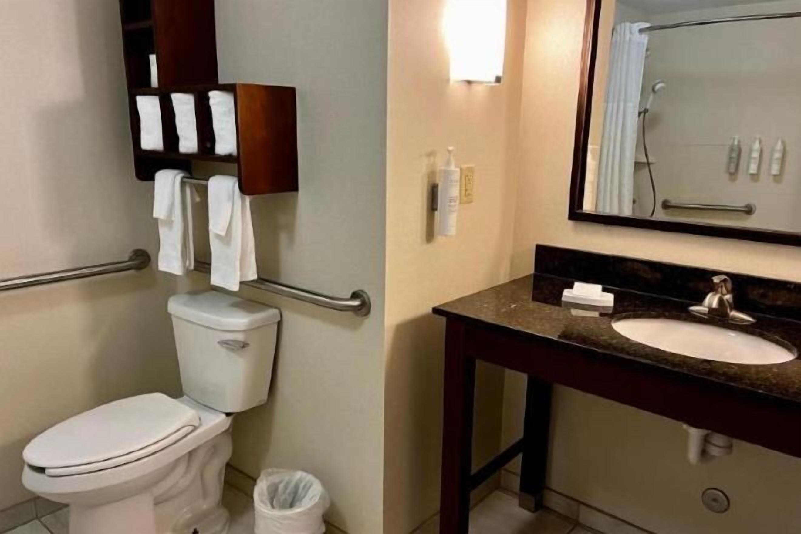 Combined shower/tub, hair dryer, towels, soap