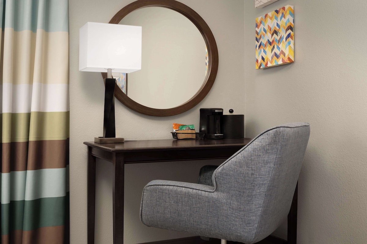 In-room safe, desk, iron/ironing board, cribs (free)