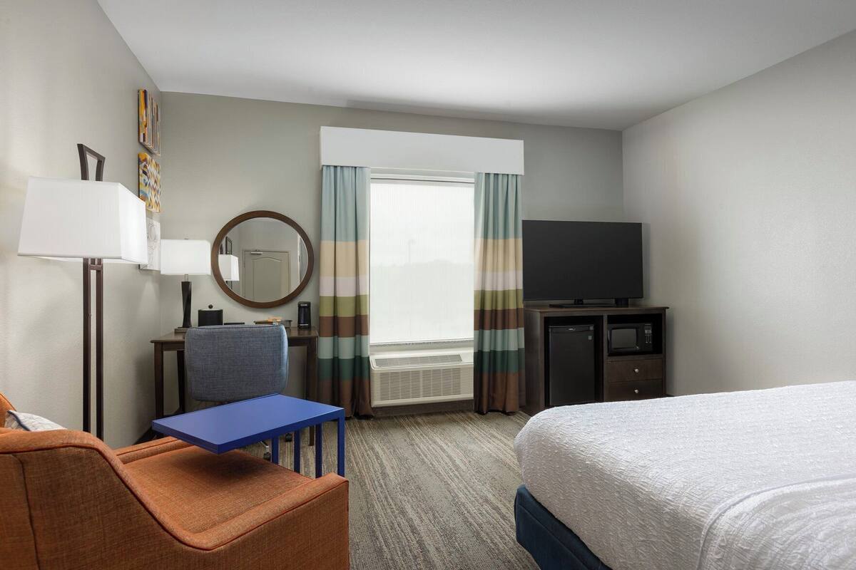 In-room safe, desk, iron/ironing board, cribs (free)