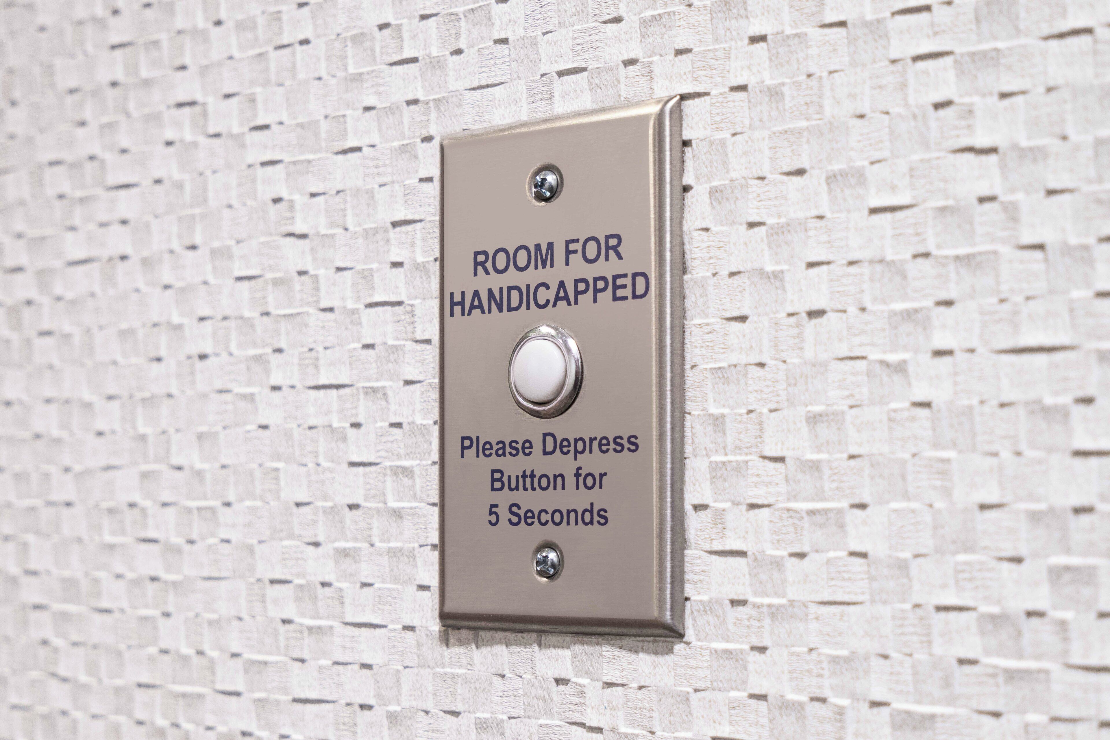 king mobile hear accessible roll in shower | premium bedding, in-room safe, desk, laptop workspace