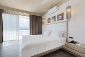 Suite | Peralatan tempat tidur premium, bar mini, peti besi dalam bilik 