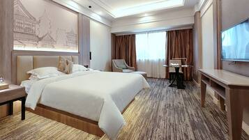 Habitación Premier, 1 cama de matrimonio | Minibar, caja fuerte, escritorio y espacio para trabajar con un portátil