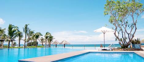 Outdoor pool, pool umbrellas, pool loungers