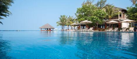 Outdoor pool, pool umbrellas, sun loungers