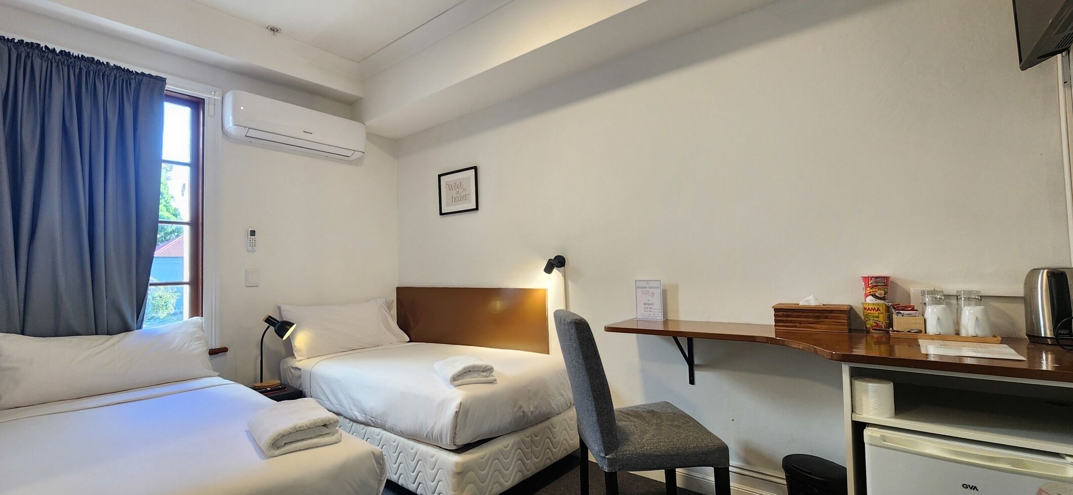 Minibar, desk, laptop workspace, blackout drapes
