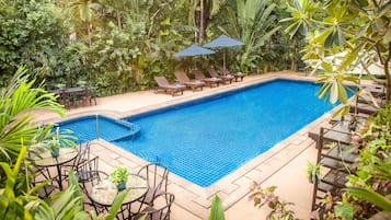 Outdoor pool, pool umbrellas, pool loungers