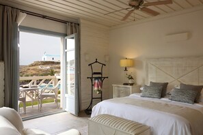 Deluxe Suite, Sea View | Premium bedding, in-room safe, desk, soundproofing