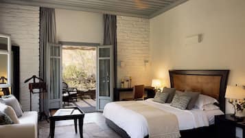 Junior Suite, Garden View | Premium bedding, in-room safe, desk, soundproofing