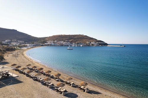 On the beach, sun-loungers, beach umbrellas, scuba diving
