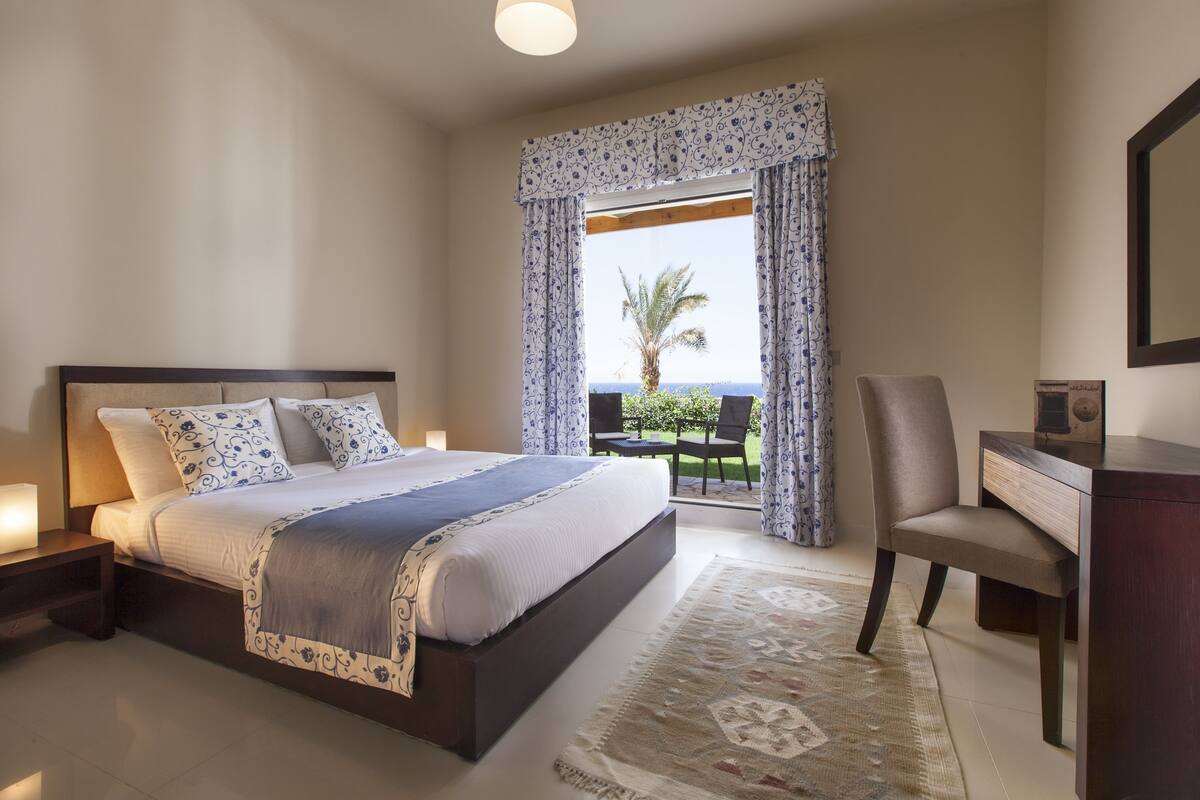 Suite, 1 Bedroom | 1 bedroom, in-room safe, blackout drapes, iron/ironing board