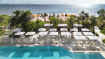 Outdoor pool, open 10:00 AM to 6:00 PM, cabanas (surcharge)