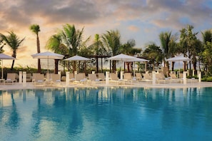 Outdoor pool, open 8:00 AM to 7:00 PM, pool cabanas (surcharge)