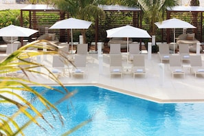 Outdoor pool, open 10:00 AM to 6:00 PM, cabanas (surcharge)