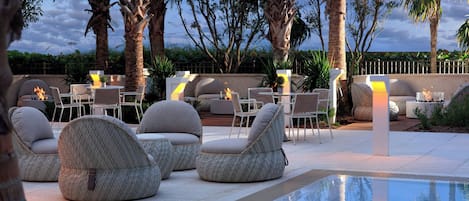 Outdoor pool, open 10:00 AM to 6:00 PM, pool cabanas (surcharge)