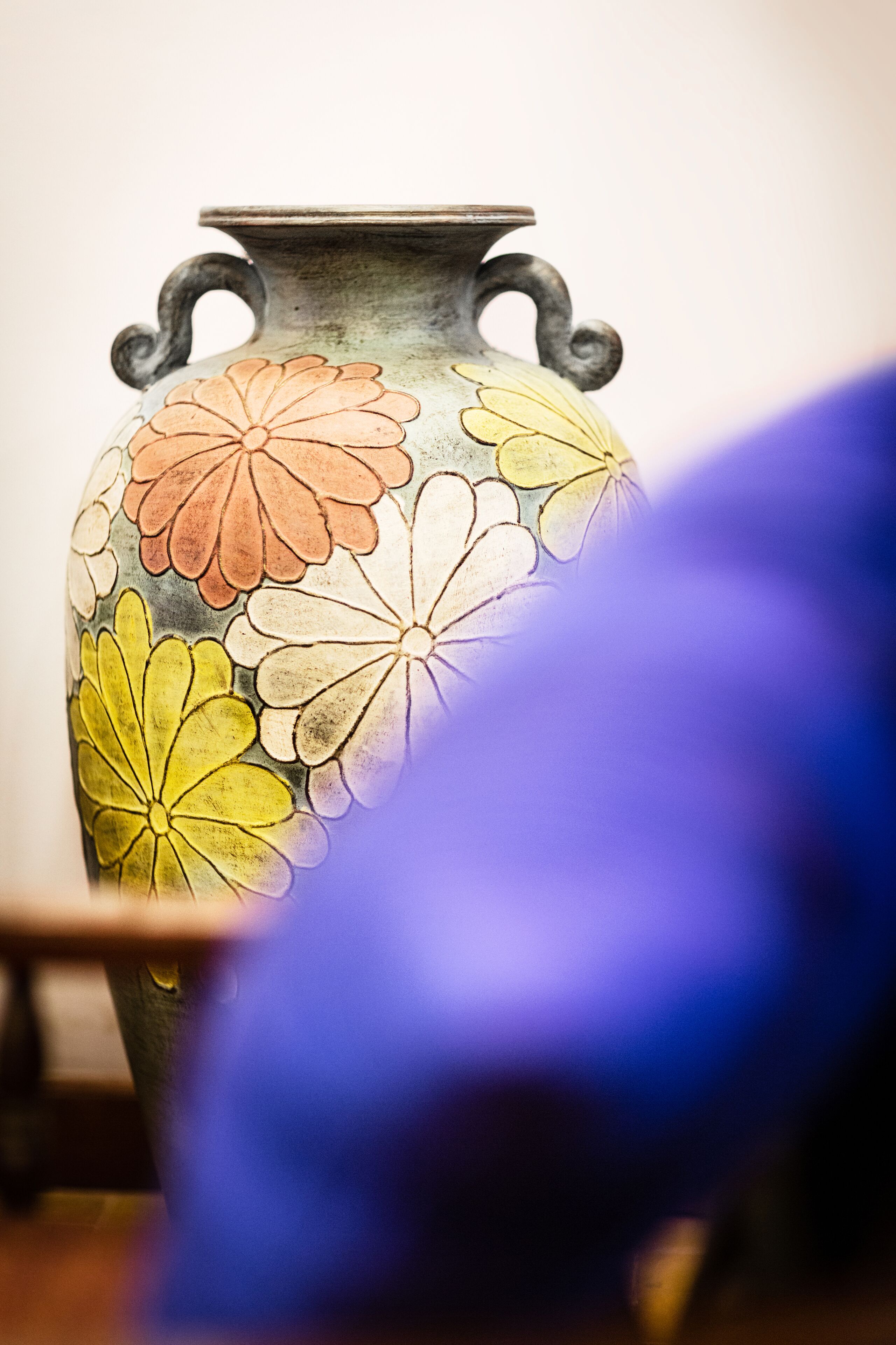 A vase with a floral pattern.