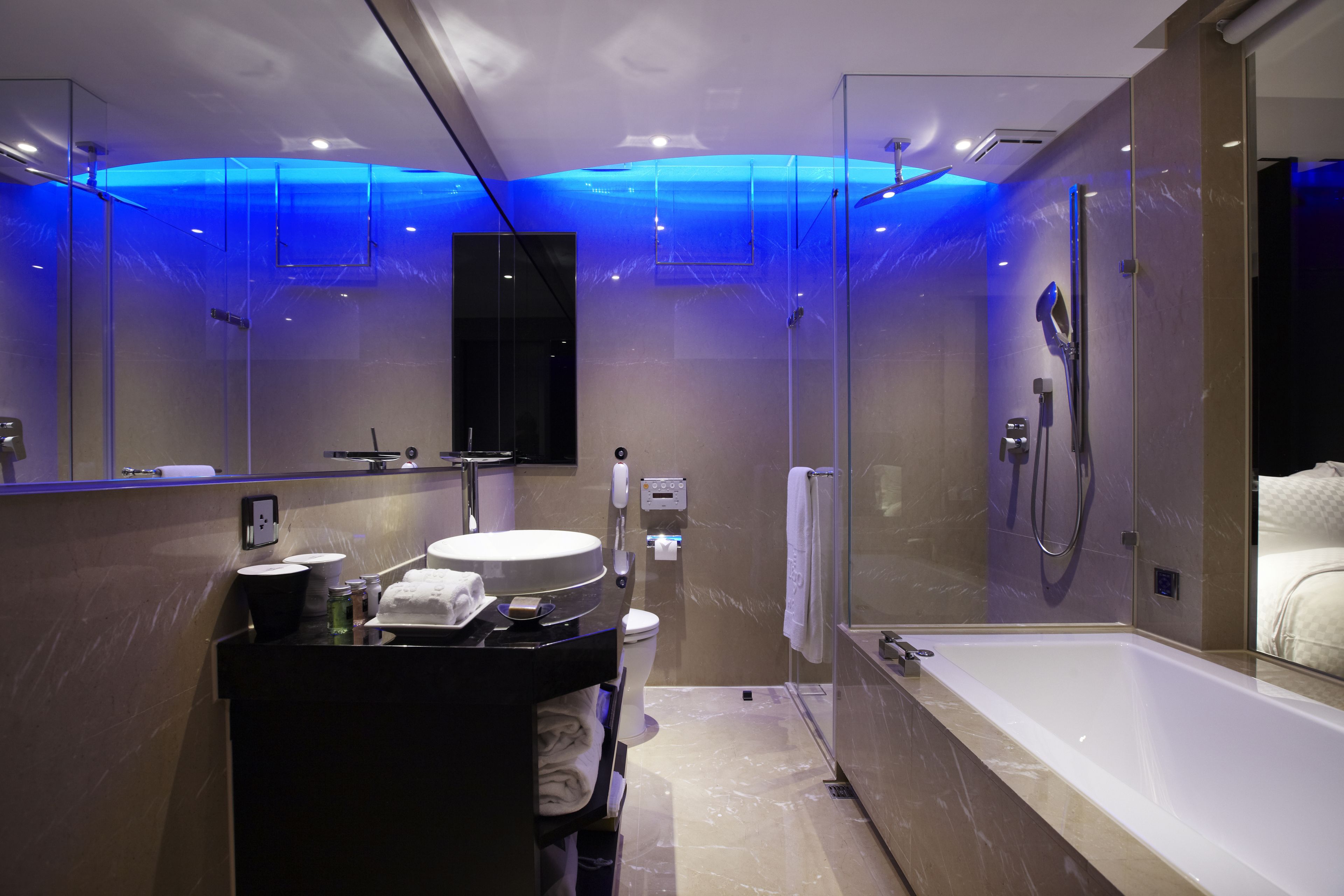 corner king | bathroom | eco-friendly toiletries, hair dryer, slippers, electronic bidet