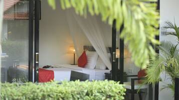 Deluxe Double Room, Pool View | Minibar, in-room safe, desk, iron/ironing board