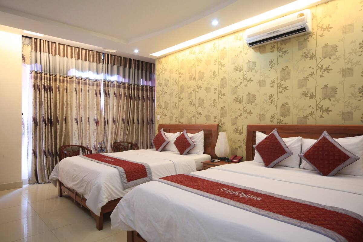 Family Room | Minibar, in-room safe, desk, free WiFi
