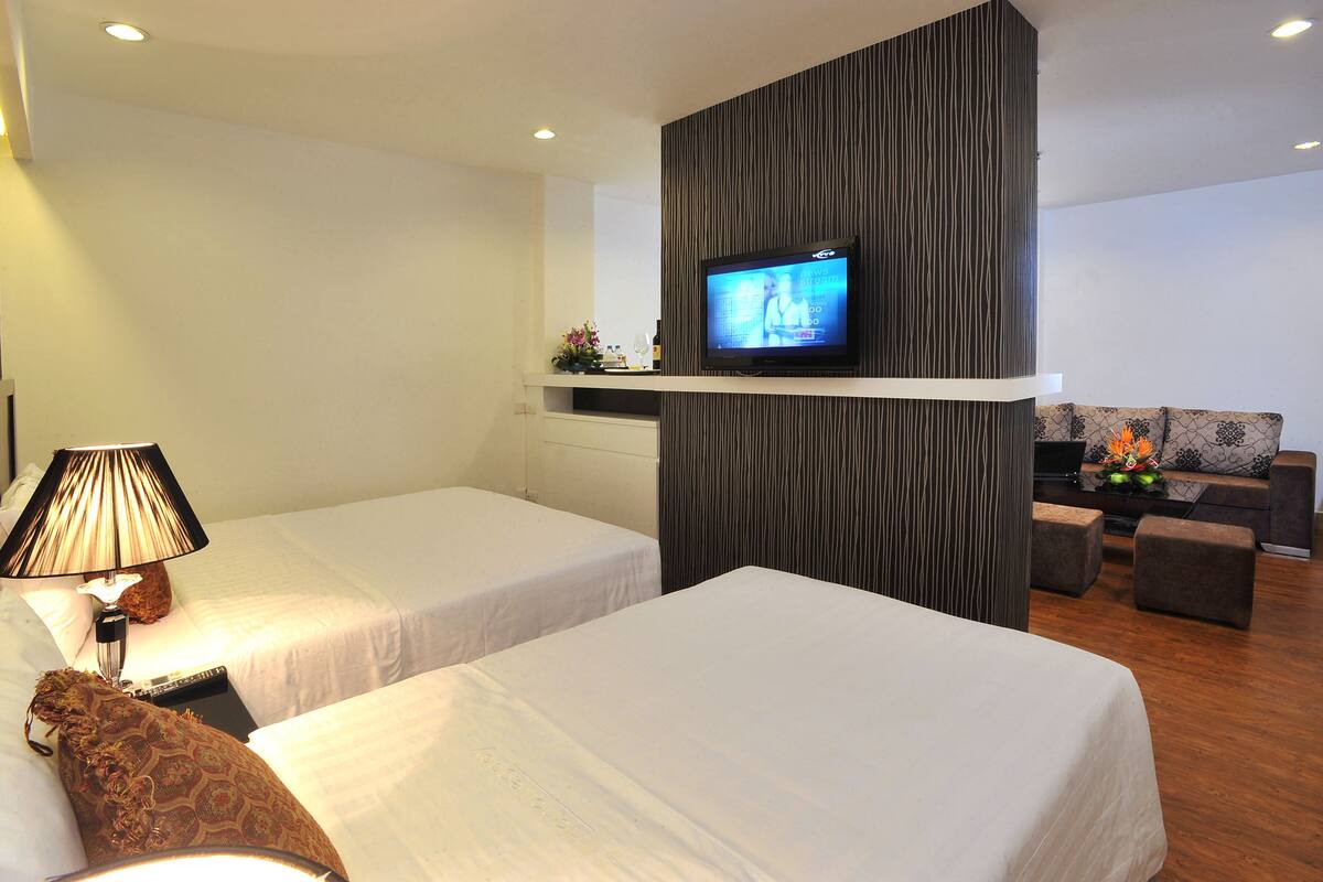 Family Room | Premium bedding, in-room safe, desk, soundproofing
