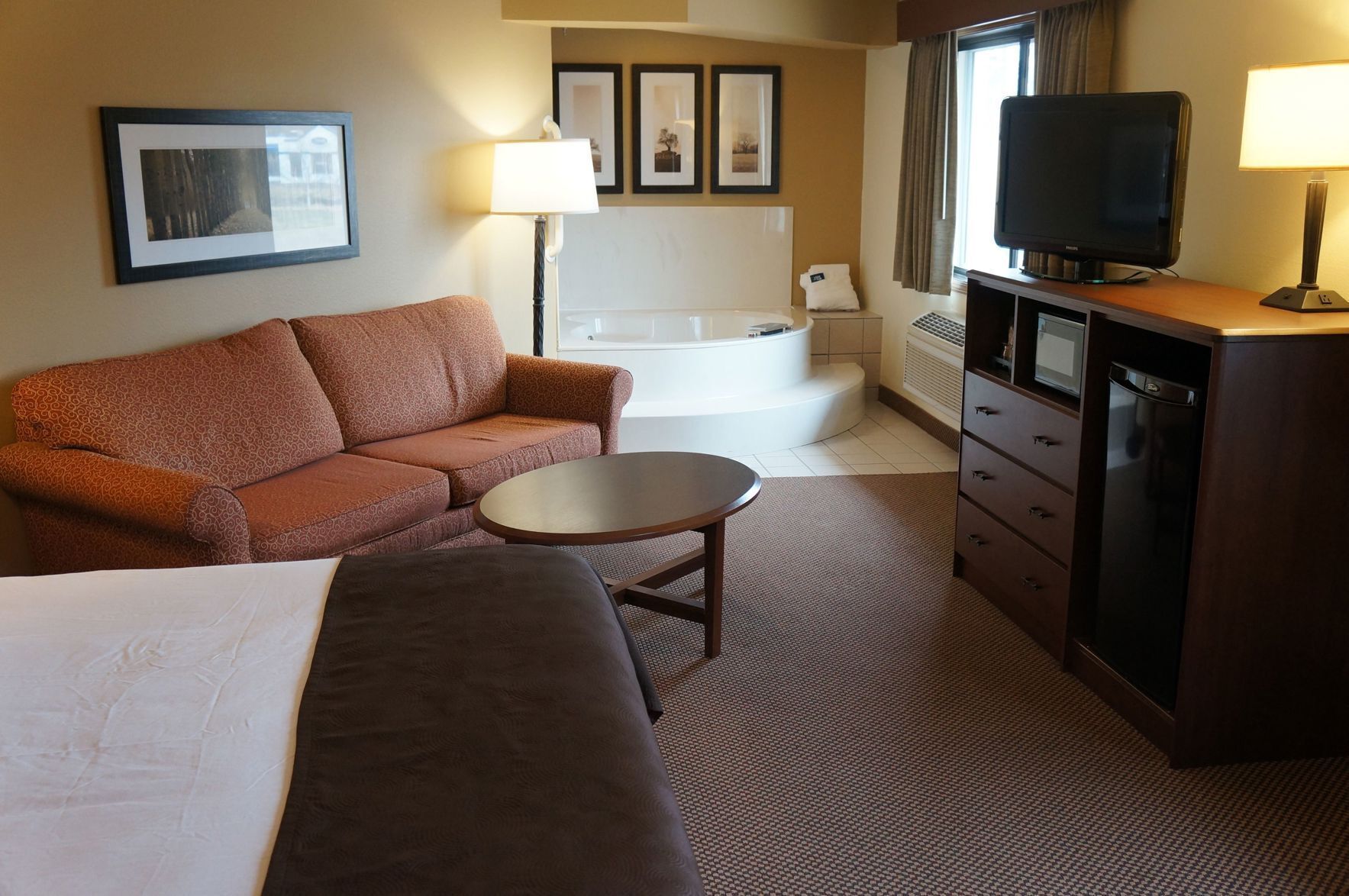 Premium bedding, desk, blackout drapes, iron/ironing board