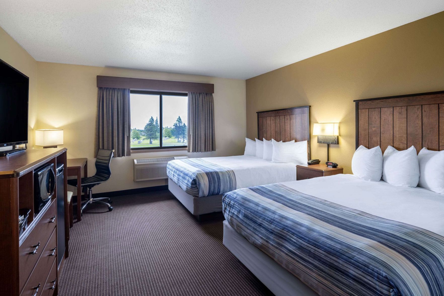 Premium bedding, desk, blackout drapes, iron/ironing board