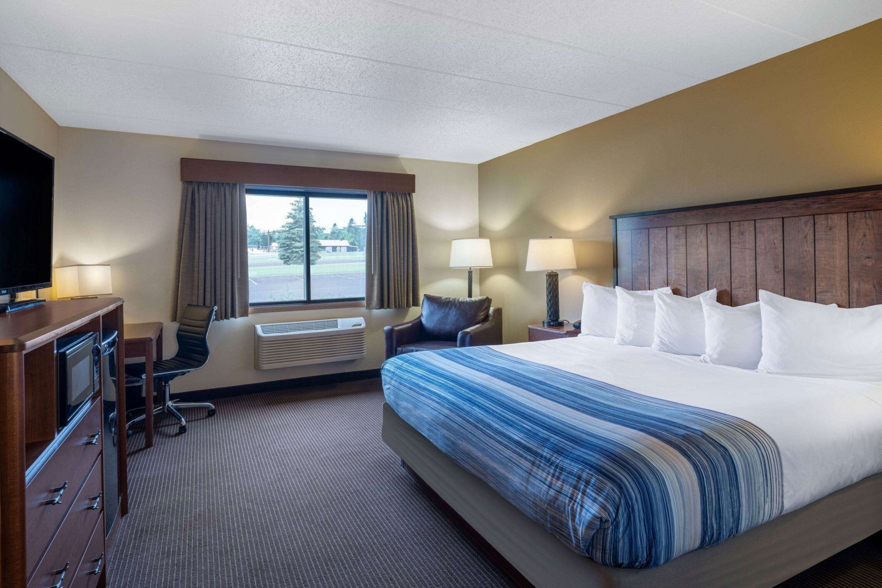 Premium bedding, desk, blackout drapes, iron/ironing board